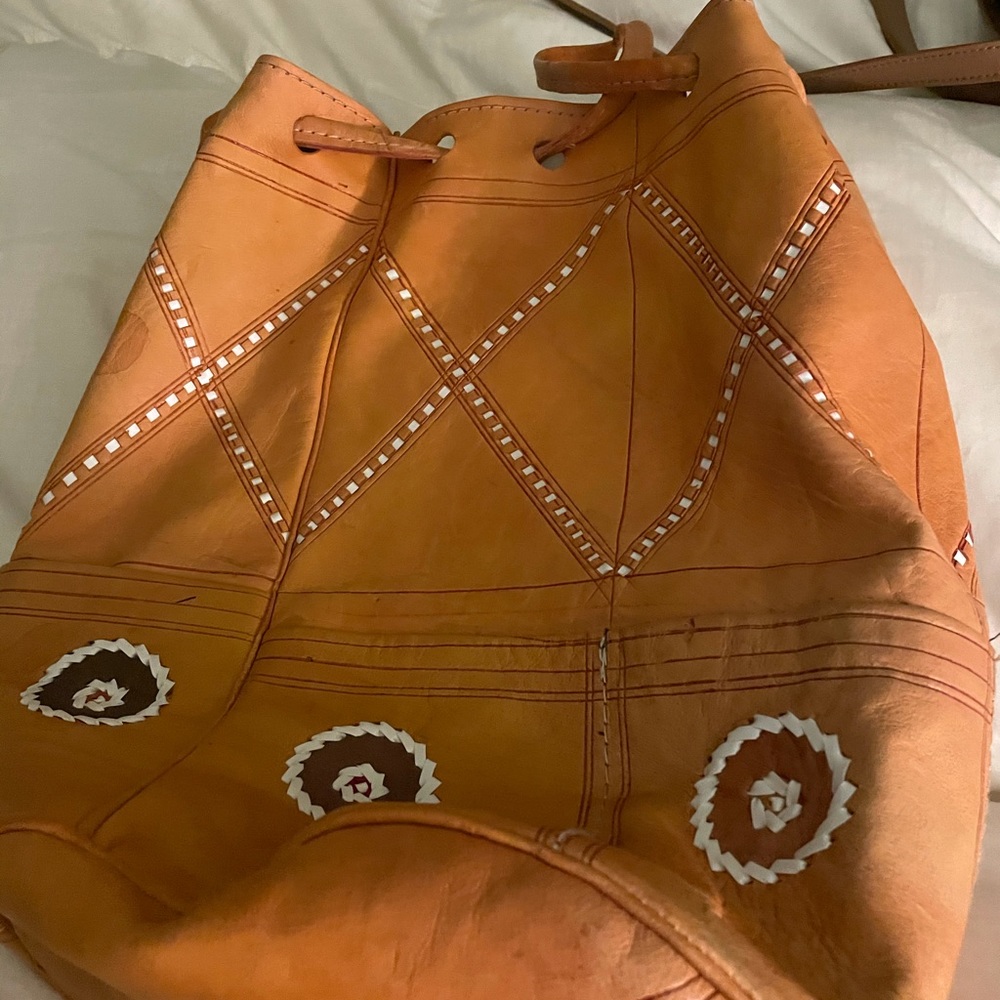 Gold soft leather backpack, pouch. Bought in Morrocco. Soft, bright, pretty.